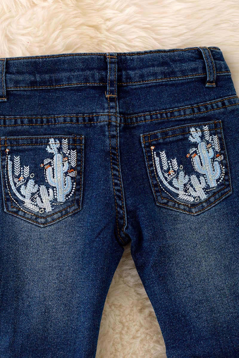 Dark blue denim w/ embroidered pocket.